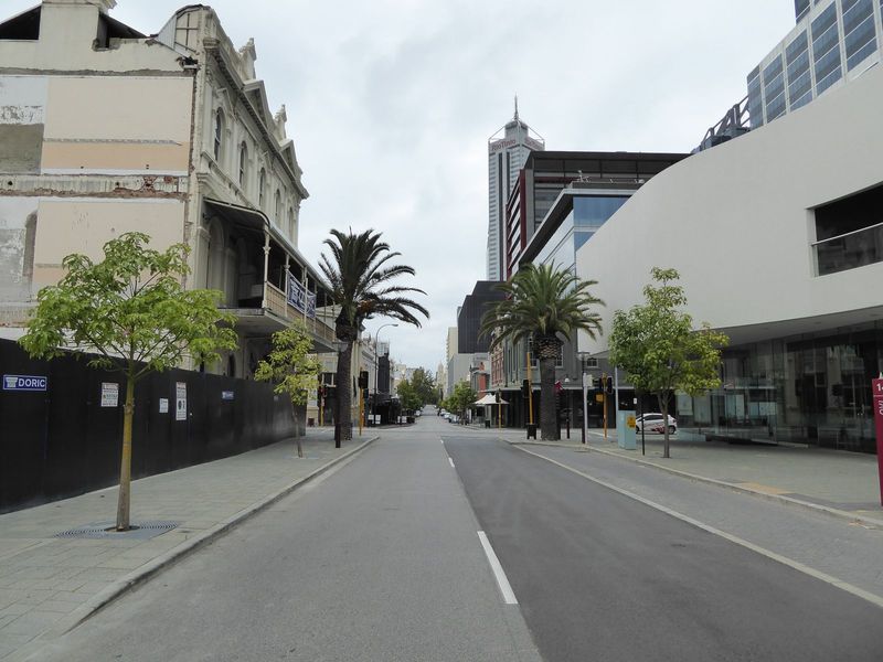 We've shifted a couple of blocks to the north and will work our way back east. The building on the left is the Melbourne Hotel, built by the