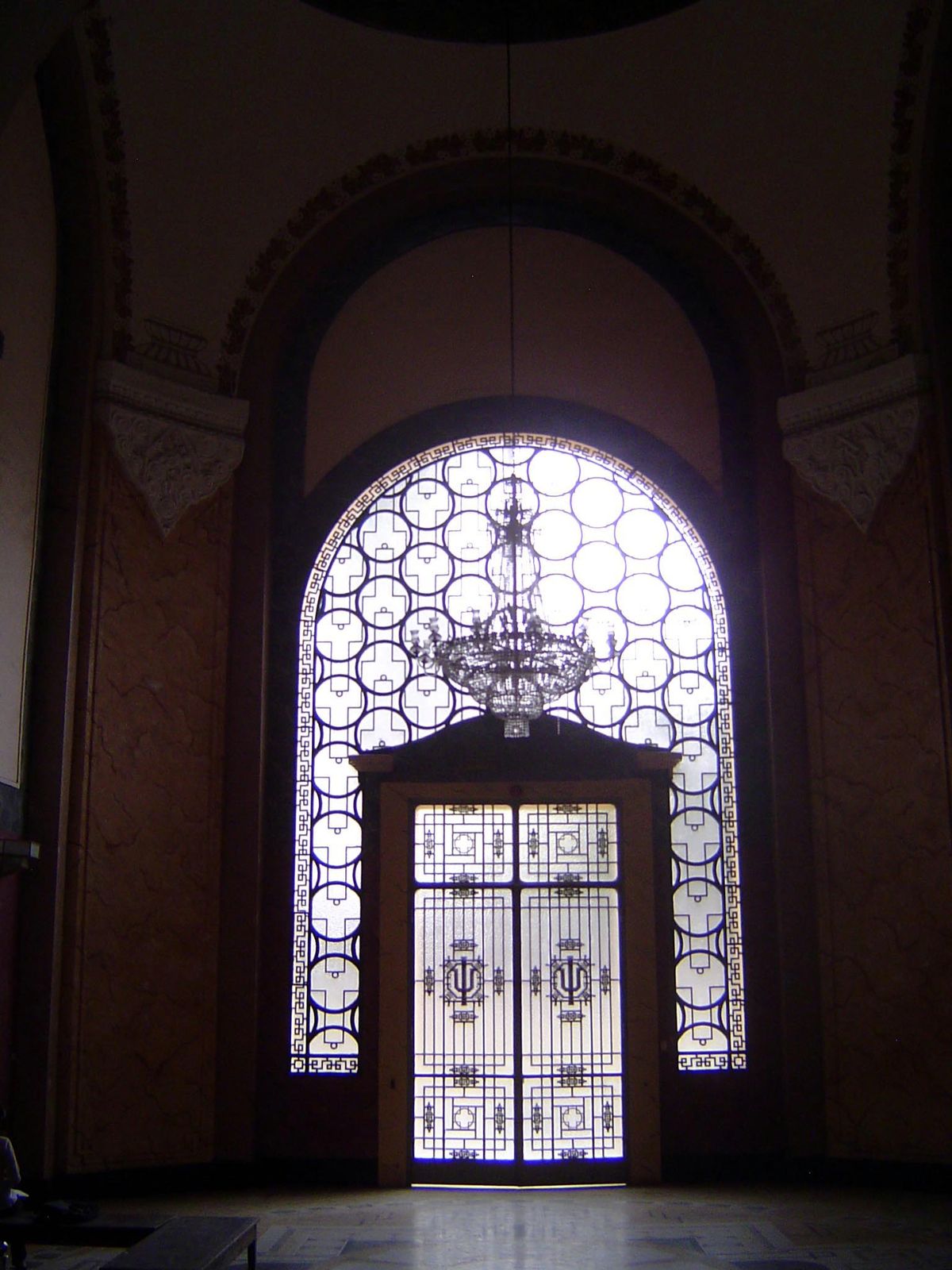 The interior is more purely European. Note the wrought iron logo, with the letter I superimposed on a U.