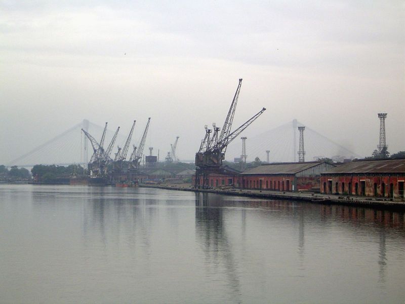 In the distance, the two towers and suspension cables of the second Hooghly Bridge.