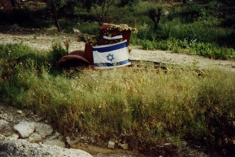 Ruins of a truck along the highway to Jerusalem. It's one of several left as reminders of the Israeli struggle in 1948 to hold Jerusalem. Th