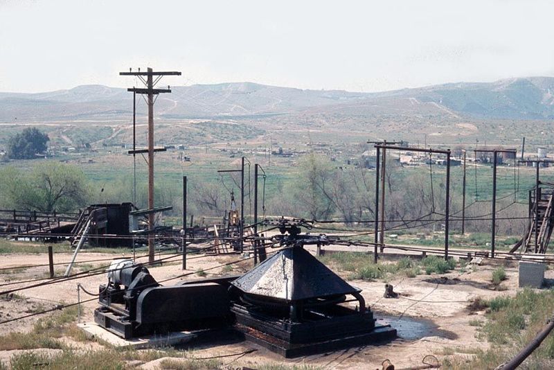 This is a "power," a central motor driving a dozen wells by cables radiating in all directions. Located in the Kern River field, east of Bak