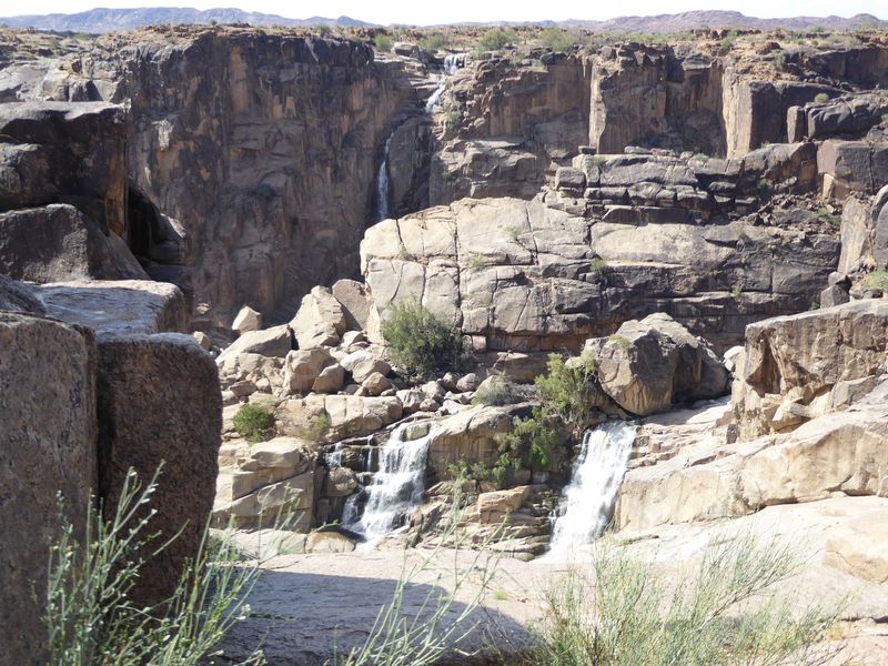 I'd rather sit in some shade downstream from the falls, but only after checking for puff adders. The waterfall is a bit undisciplined, and y