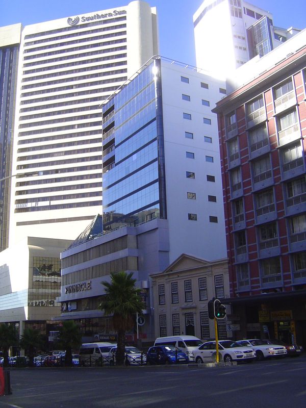You can't help feeling sorry for the hopelessly overpowered Koopmans de Wet House on Sea Street, once the beach drive. The land was granted 