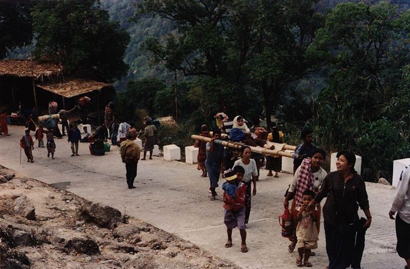 Trucks run up and down the mountain, but the last bit is by foot or sedan chair.
