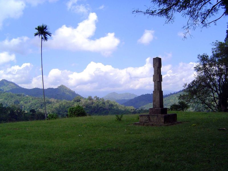 We've driven east for about an hour to the small town of Medamahanuwara, then walked for 10 minutes to this stone monument. The path is poor