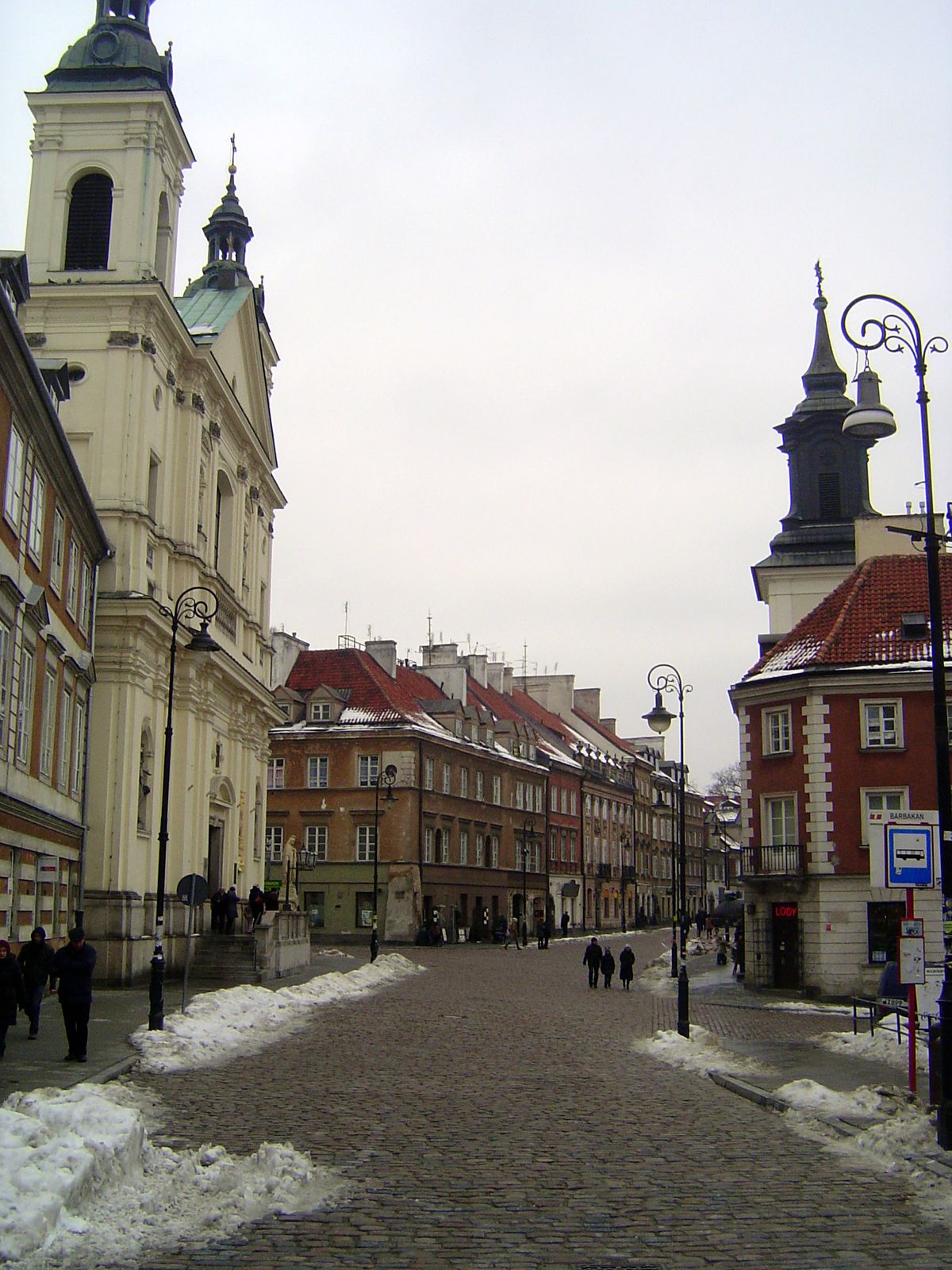 The main avenue between the square and the palace, with the Jesuit Church on the left and St. John's, out of sight in the setback just beyon