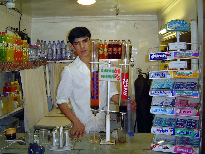 Thirsty? There are plenty of soda fountains, with syrup in cylinders and tanks in the back to make the water fizz. Nice guy, but how custome