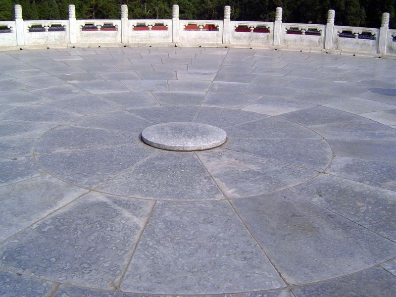 See the pattern? The altar has a central block. It's ringed by nine stones. How many in the next ring? Answer: 18. The one after that? Answe