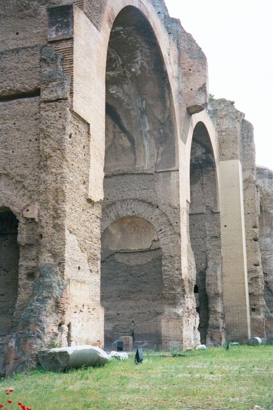 These arches supported the central hall, once a cool pool but now with grass. Through the arches and to the left, there was a cold plunge. A