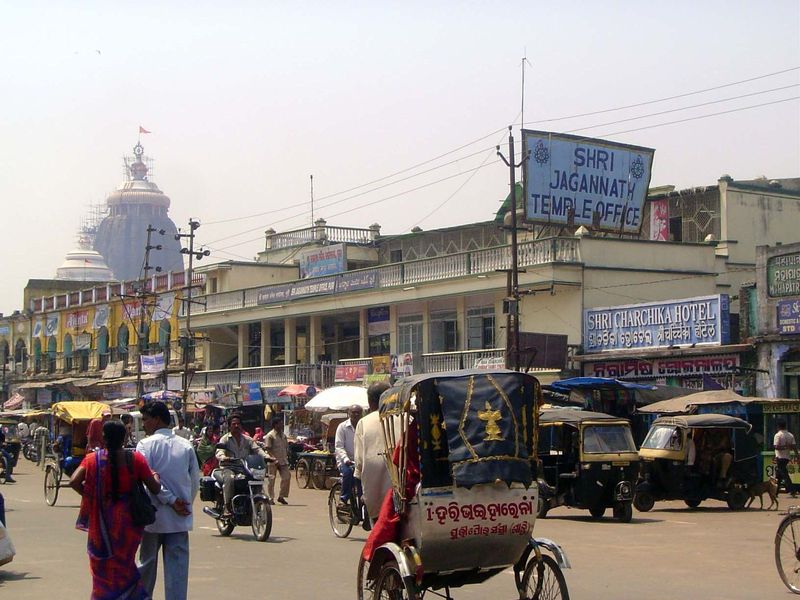 The temple office, with lots of donations to manage. The tops of the main sanctuary and its accompanying porch are in the distance.