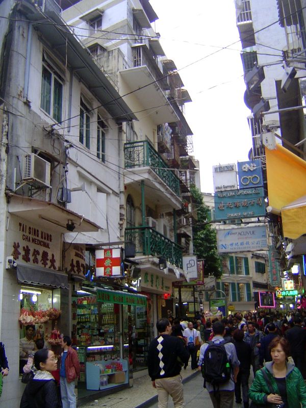 Pons writes p. 34 of "the bliss of the Asian street, where intimacy blends with collective life... A street is everything at once: it is a m