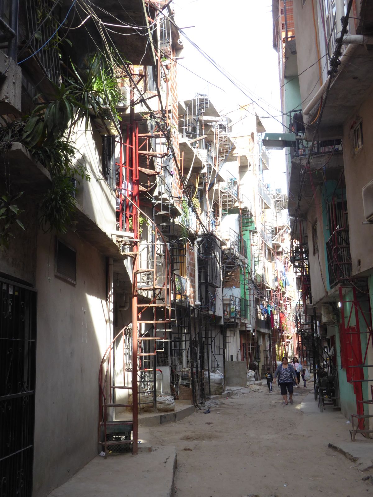 Buildings here as late as 2000 only reached a maximum of four floors, but the population is growing—mostly with newcomers from Paraguay, Bol