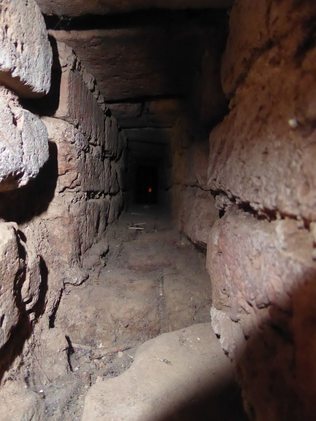 A ventilation shaft leads to some hidden central space but does reveal the crudely mortared brick core.