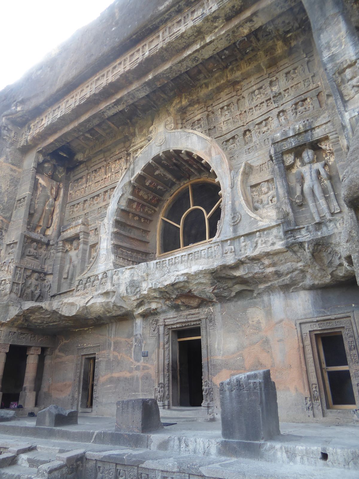 A veranda has collapsed, leaving behind a jagged edge and the stubby bases of columns, bits of which survived into the 19th century and are 