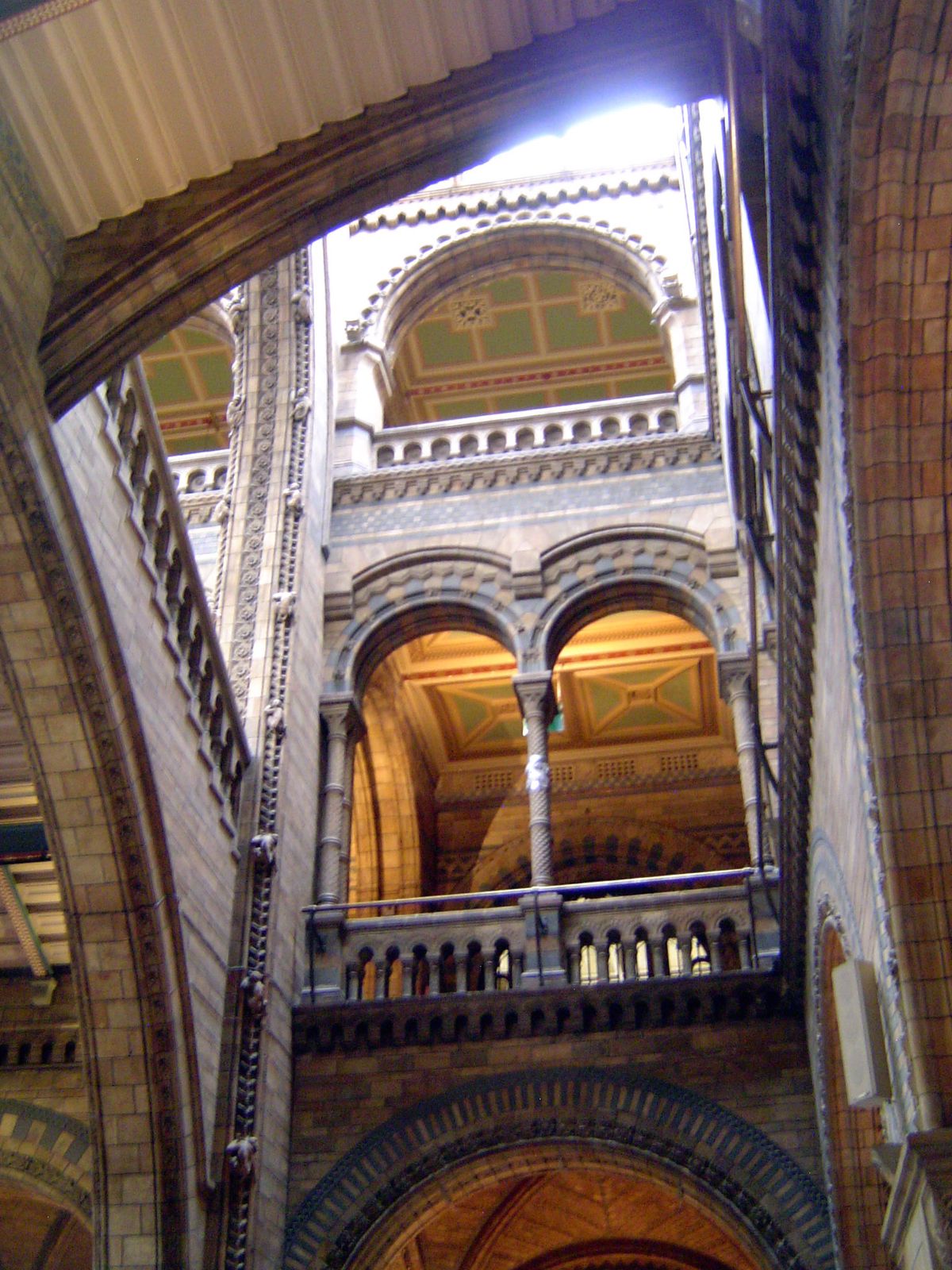 The view from the entrance hall of the upper floors. Monkeys climb the piers, consistent with the original intent of Richard Owen, the first
