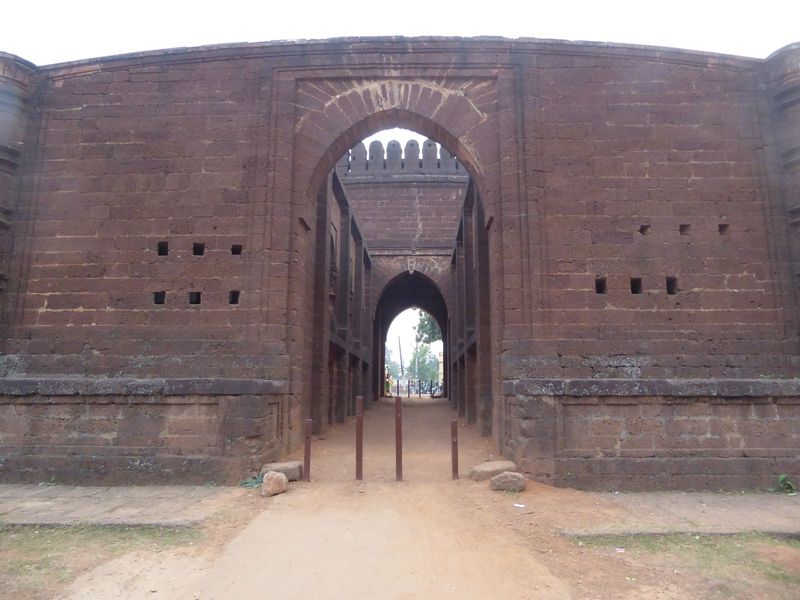 Bir Hambir's son, Raghanath Singh, or possibly Raghunath's son and successor, Bir Singha Dev, built the "stone door" one brief century befor