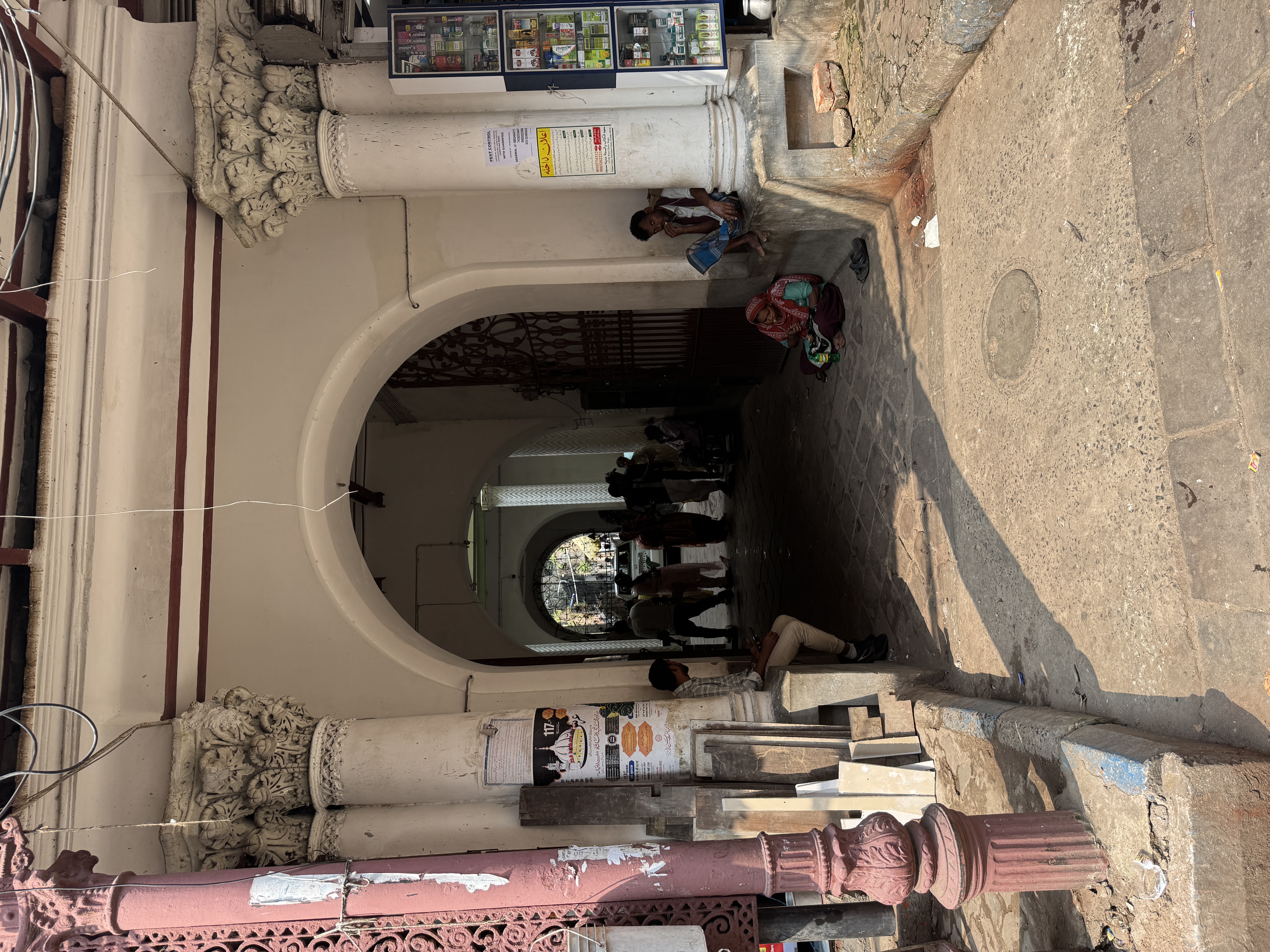 If you scrutinized the building's facade two images back, you might have noticed this entrance.  It leads to the Salehjee Musafir Khana Waqf
