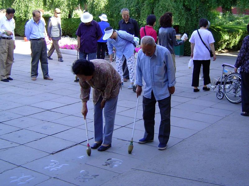 Some holdouts: calligraphy practice in the park at the foot of Jingshan.