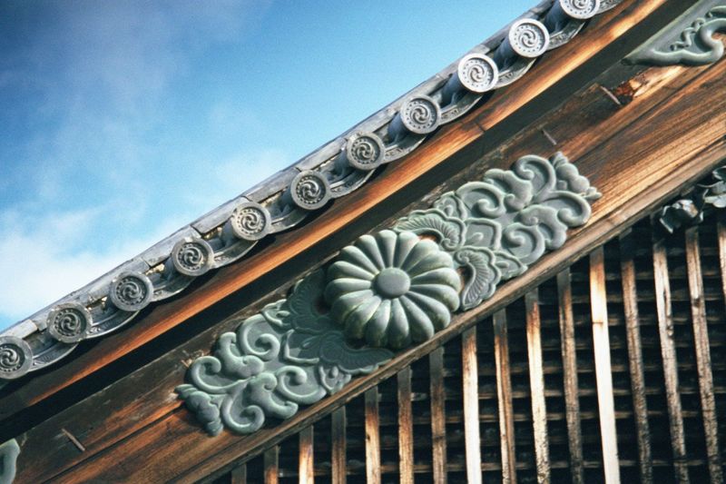 Eave detail, with the ubiquitous emblem.