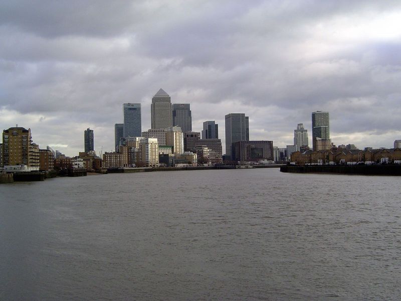 The view of Canary Wharf from the park promenade. The river here begins a great meander to the south and around the Isle-of-Dogs, after whic