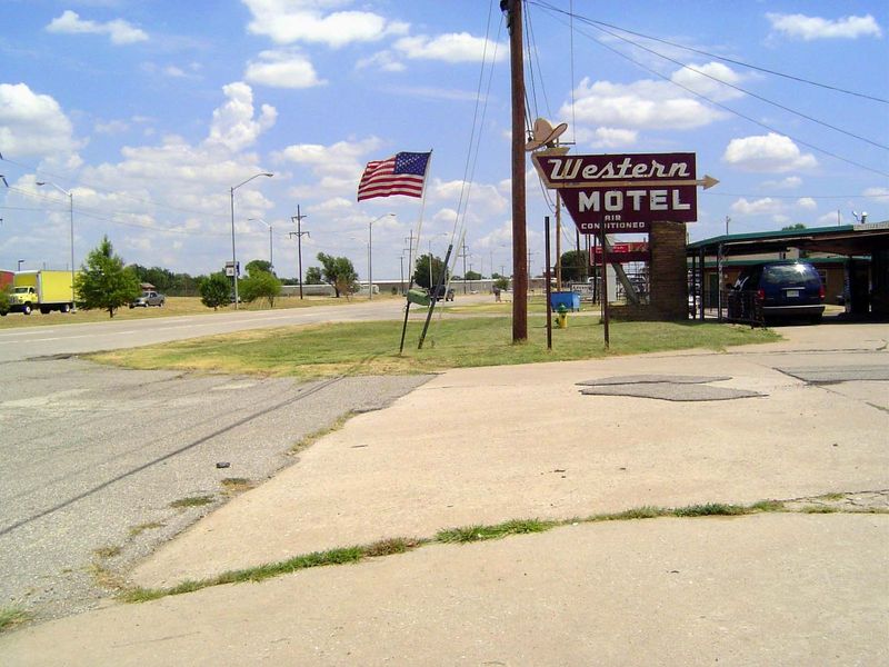 A 1953 motel at 7600 NW 39th. In the median you can even make out the old U.S. Route 66 sign, here pulling in behind you from Weatherford, C