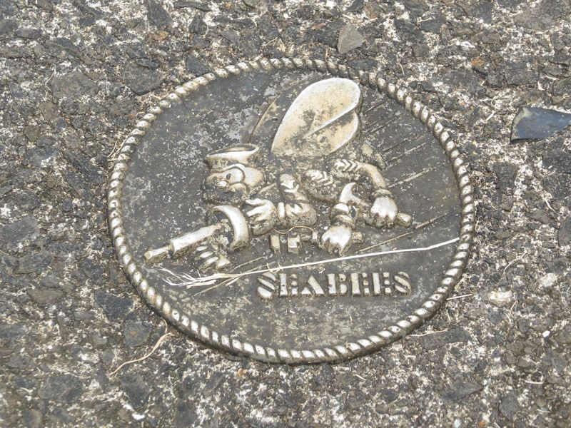 Bingo: the emblem of the U.S. Naval Construction Battalions, the C.B.'s.