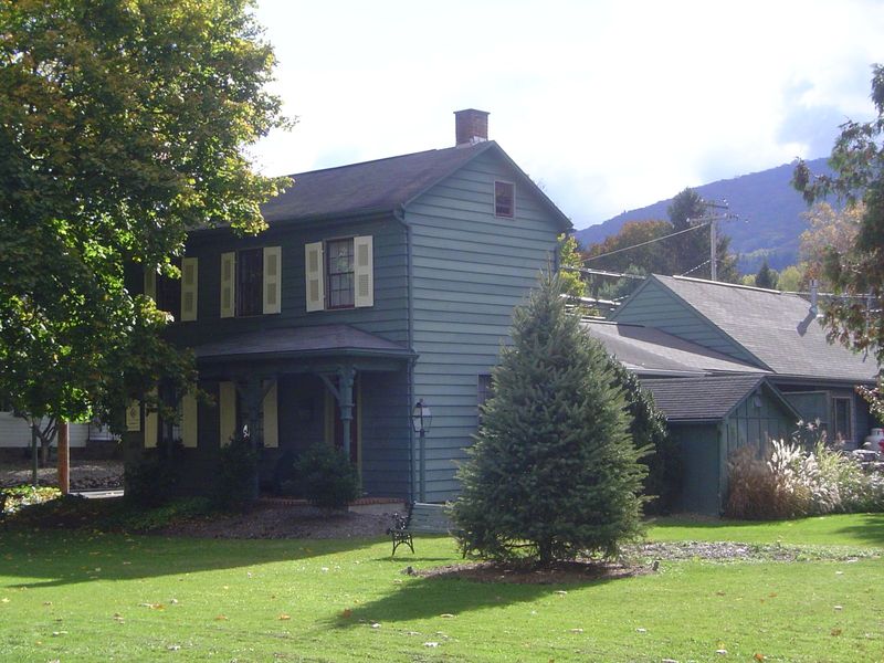 Wood gradually replaced stone, and in the mid-19th century porches began appearing. This one, unlike the one on the Bellefonte public librar
