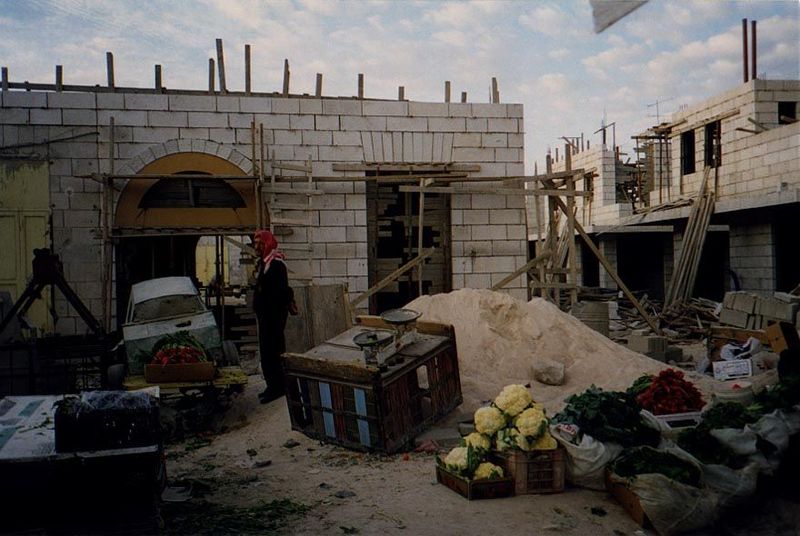 Another picture of the new market under construction. The buildings are concrete, with a thin stone veneer, typical of modern construction m