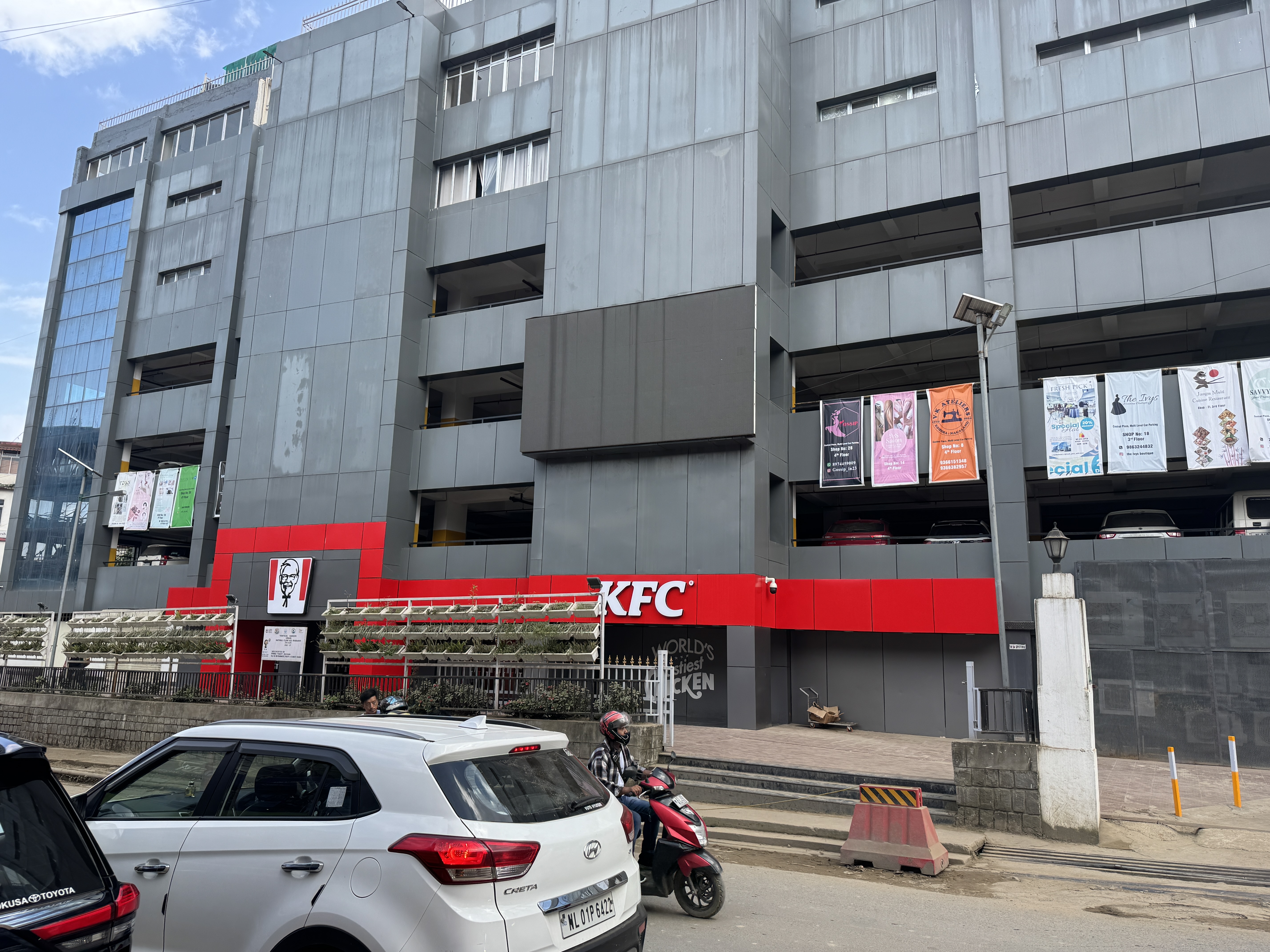 Perhaps the answer is implicit in this Kohima multi-story car park and shopping center, about a kilometer south of the war cemetery.  It ope