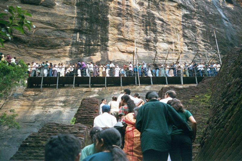 The line grew solid up the approach steps and then along the catwalk that climbs the tower.