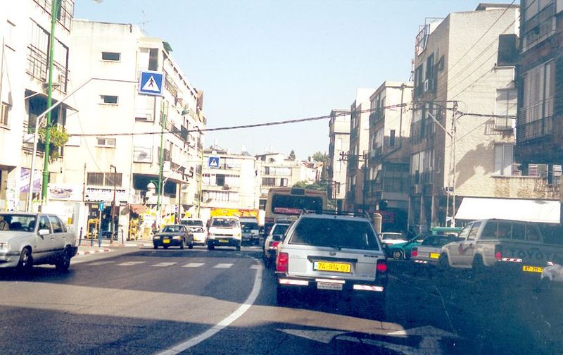 On flats surrounding the hill, 20th century Jaffa spreads out monochromatically but with a flood of sunshine.