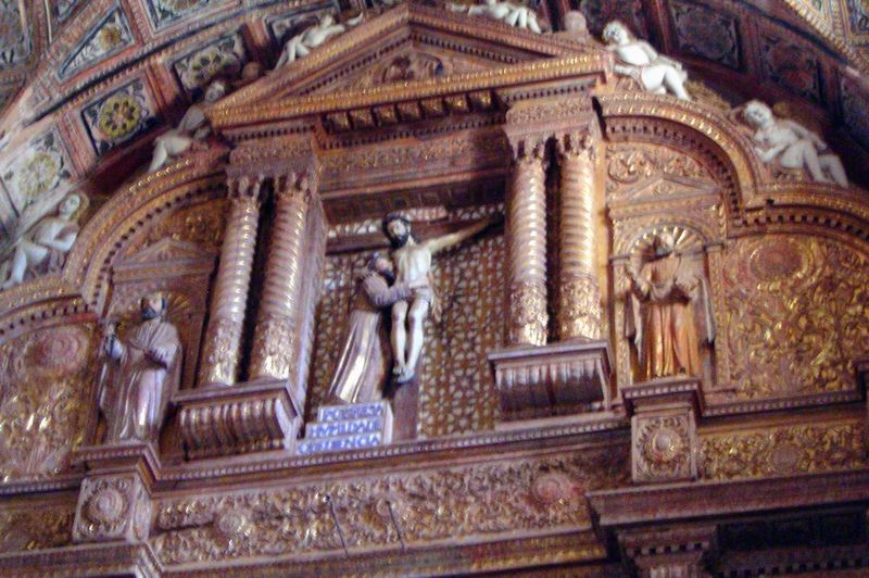 The high altar has a surprisingly informal image showing a crucified Christ with one arm on the shoulder of St. Francis, who embraces him. F