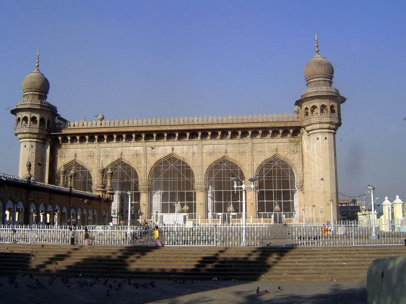 At ground level, looking across the large courtyard in front of the mosque. The structure on the left covers the tombs of Hyderabad's nizams