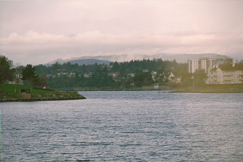 Turning into the harbor—closed to the left foreground but opening to the sea around the point. This is not the entrance to the famous Esquim