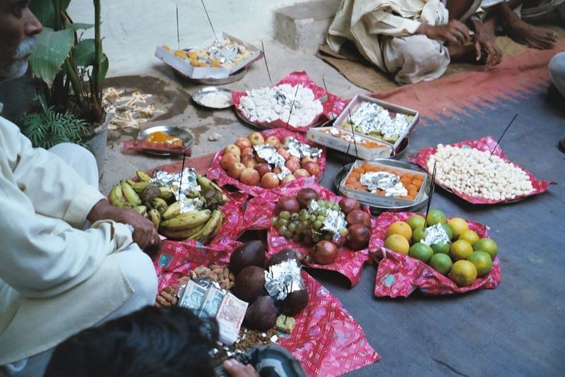 Fruits, as well as money, are displayed.