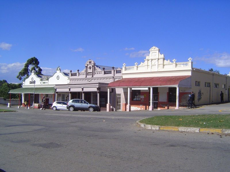 High Street, leading from the station into town is exceedingly wide but lined with simple shops whose only concession to style is fancy para