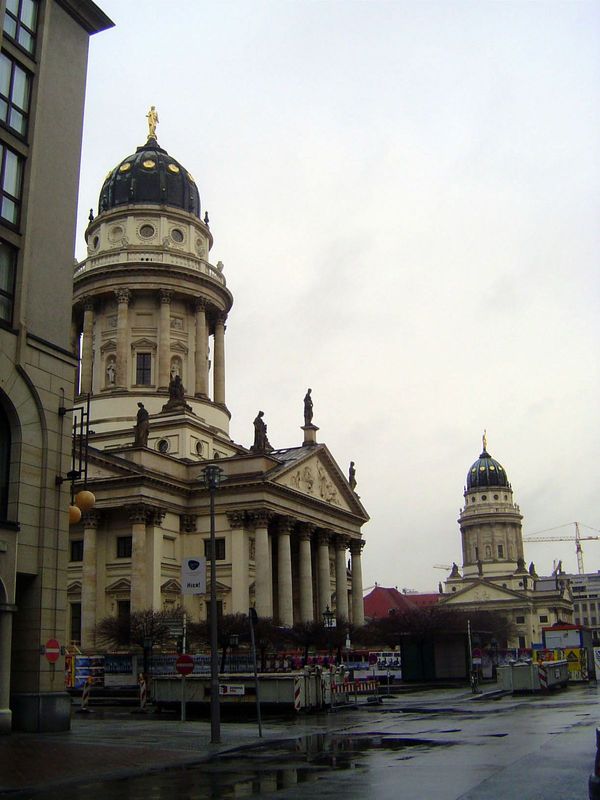 A two-minute walk south of Unter den Linden is a large square, the Gendarmenmarkt, punctuated with matching cathedrals—German and French—fro