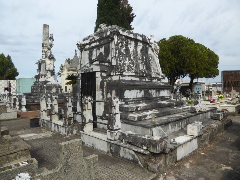 See the bust near the column on the left.
