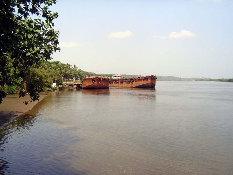 Visitors today arrive by road, but in the old days they came up the Mandovi River, here at low tide five miles from the sea. There's a lot o