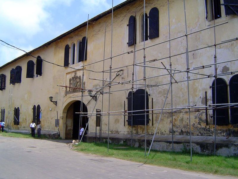 The other side of the same gate, showing the old warehouse once integrated into the wall.