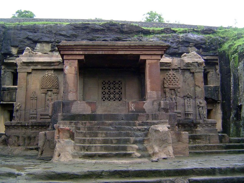 We're going to take quick look at some neighboring caves, neither as spectacular as Kailash but with expressive sculpture. Here, the entranc