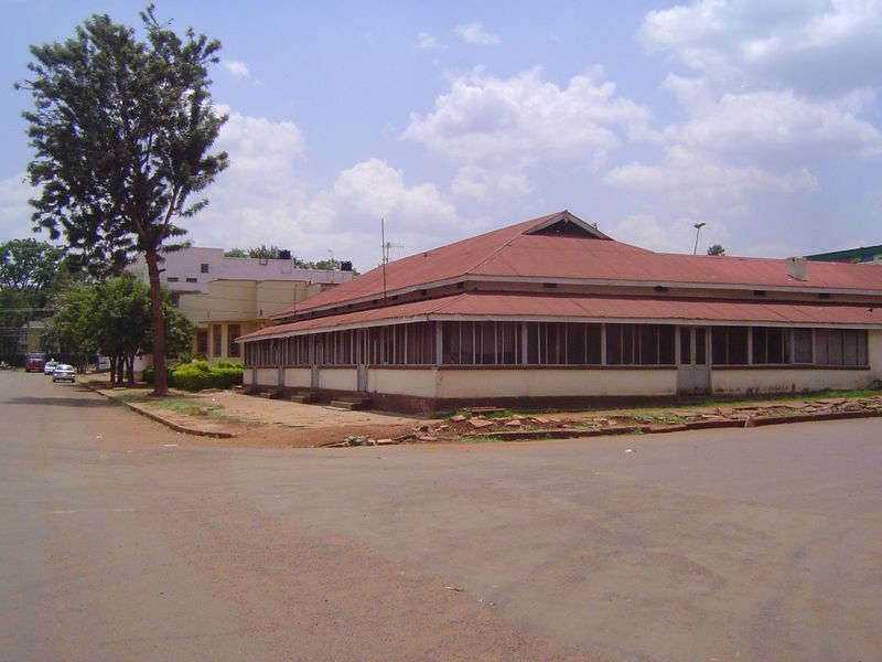 An apartment house with screened verandas.
