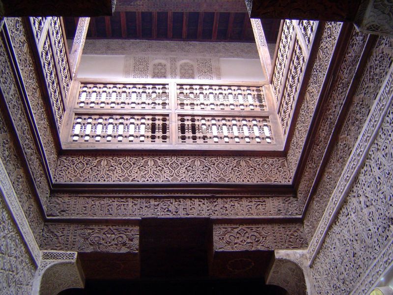 The view to the upper floor, filled with the small rooms once used as living quarters by students.