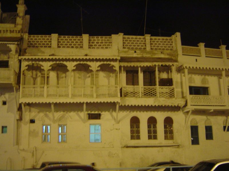 Still at night, a remarkable stretch of the Muttrah waterfront called Sur Lawatiya, founded about 1700 perhaps by Portuguese or Hyderabadi t