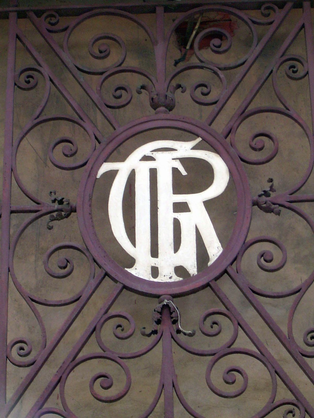 Logo on the station building of the former Trinidad Government Railroad.