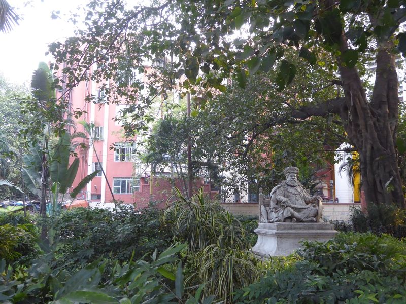 Almost lost in the shrubbery nearby is this statue of Lakshmeshwar Singh, the Maharaja of Darbhanga. The statue was placed in 1904. With sci