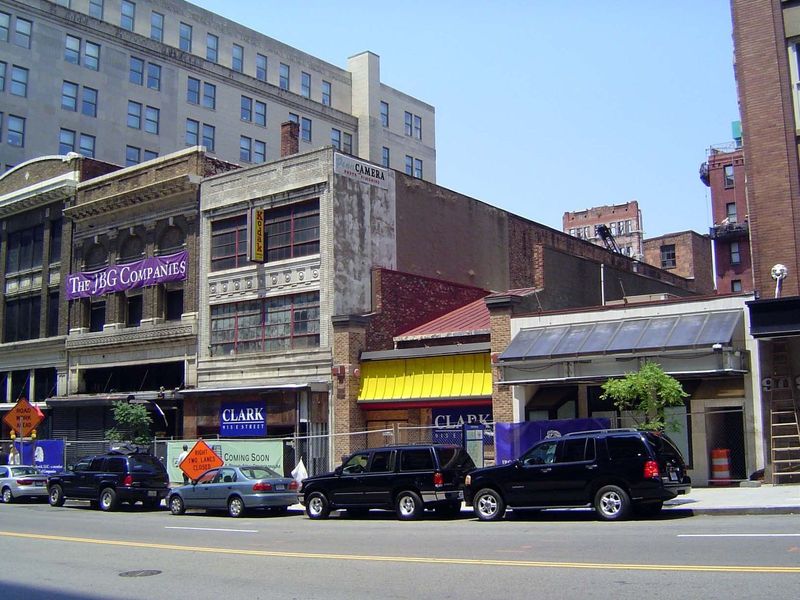 As the fashionable part of town migrated west of the White House, the old core began decaying. That's changing now, as the contractor's fenc
