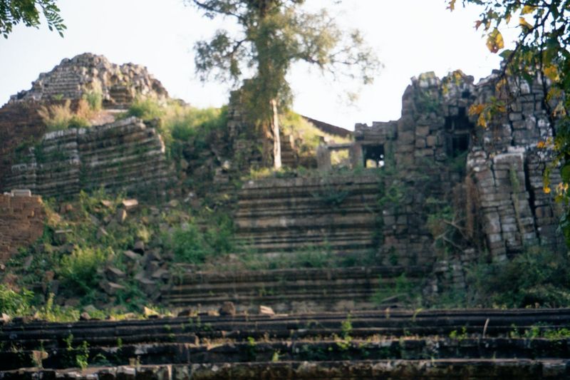 Immediately to the northwest of the Bayon is a ruined five-tier pyramid, which has been under reconstruction for the last 30 years. It is th