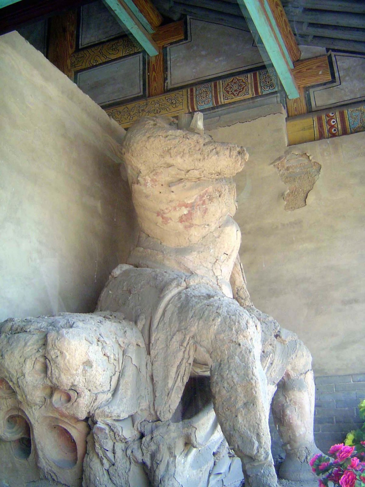 About the only thing left from the past is this statue of a protective deity.