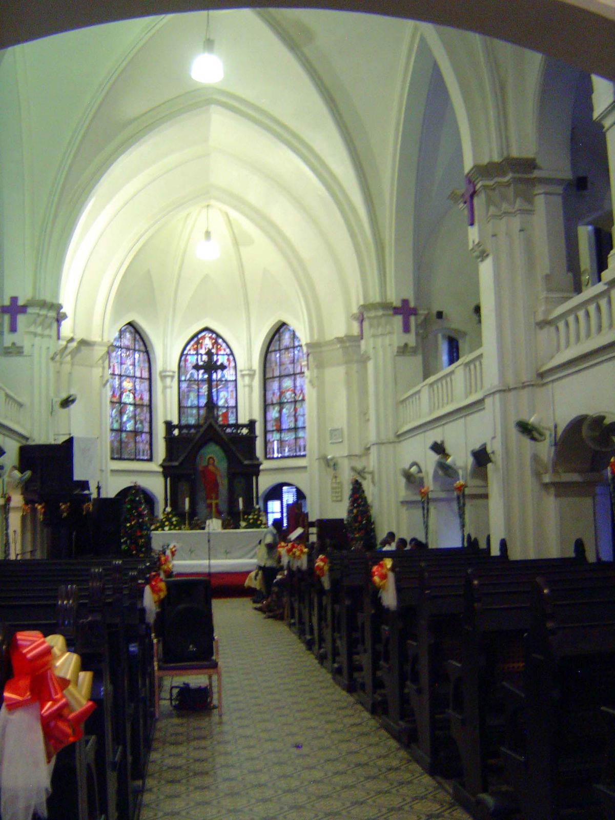 The pews are indestructible, apart from their with woven-cane seats and backs.